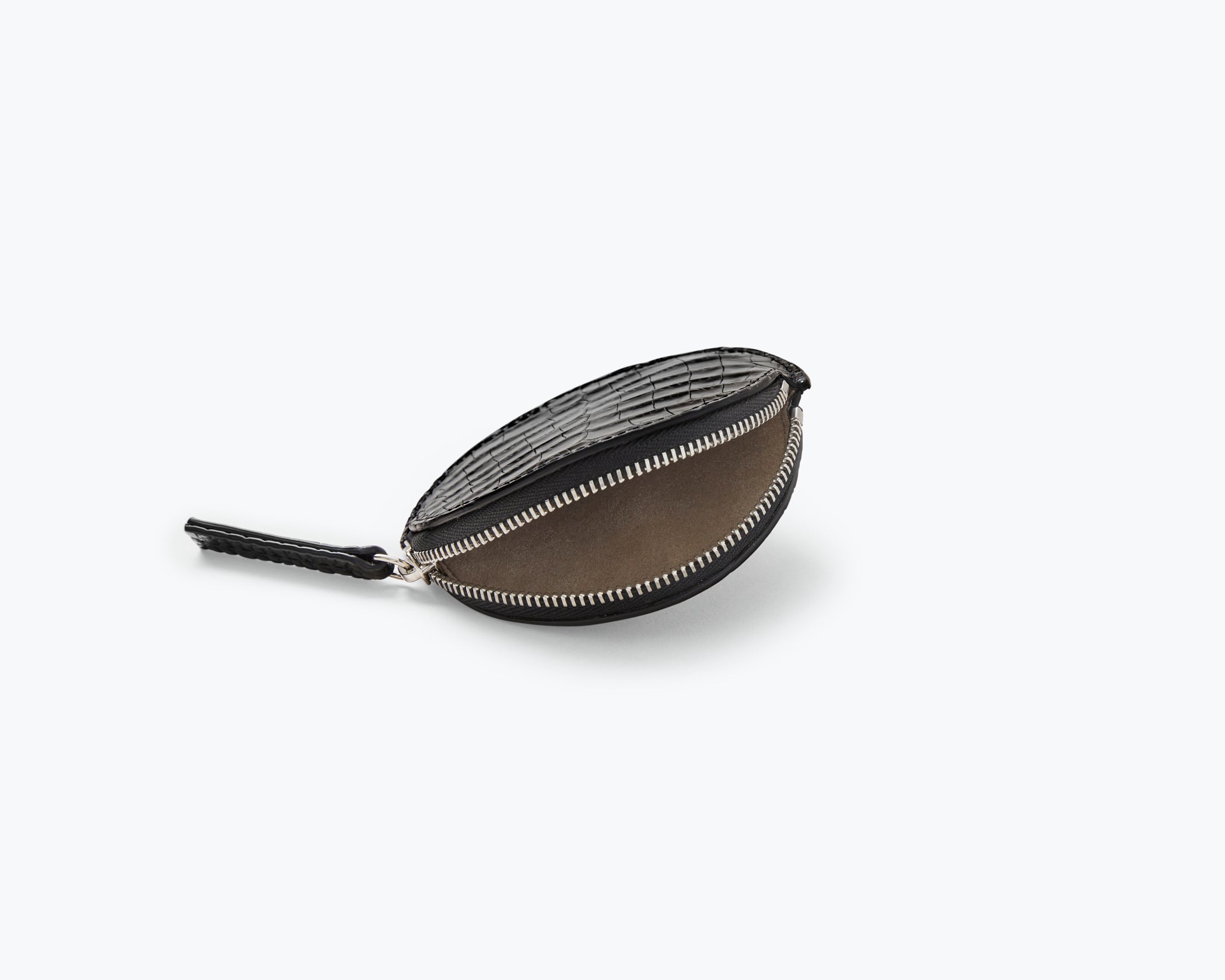 Freda Salvador JO Small Circle Pouch inside view showing compact bag with interior compartments and stylish design.