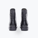 Freda Salvador Ralf lace-up boot featuring smooth leather, rounded toe, chunky heel, and stylish design on a neutral background.