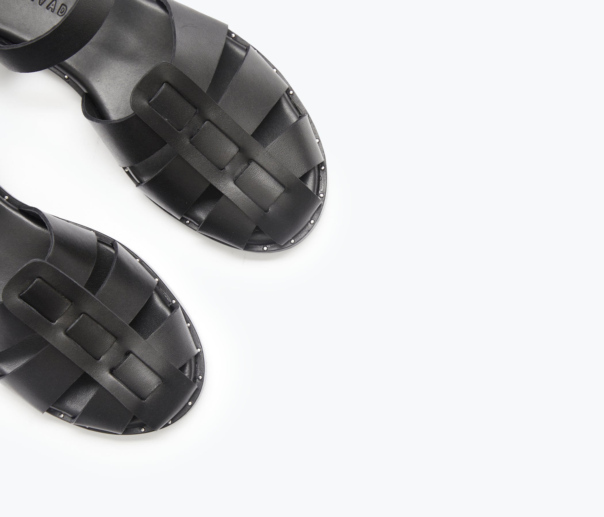 Black SERA Fisherman Sandal by FREDA SALVADOR featuring a woven strap design and open toe style.