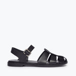 Black SERA FISHERMAN SANDAL by FREDA SALVADOR featuring a closed-toe design and adjustable strap, front view.