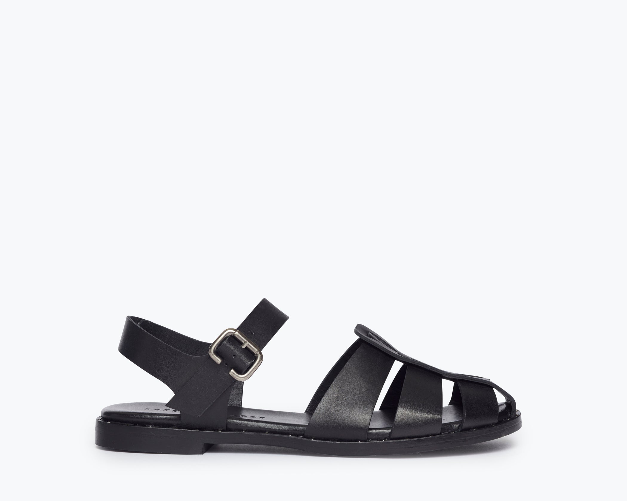 Black SERA FISHERMAN SANDAL by FREDA SALVADOR featuring a closed-toe design and adjustable strap, front view.