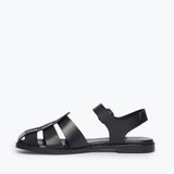Black SERA Fisherman Sandal by FREDA SALVADOR with leather straps and inside view showing detailed craftsmanship.