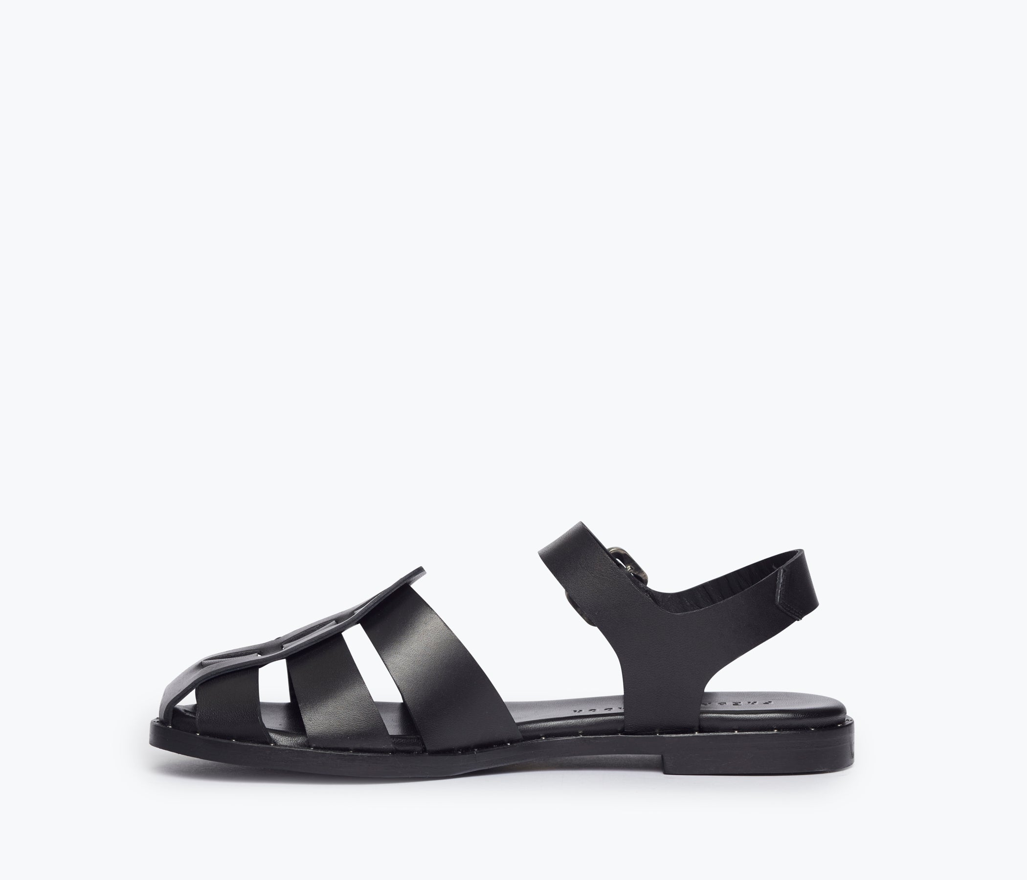 Black SERA Fisherman Sandal by FREDA SALVADOR with leather straps and inside view showing detailed craftsmanship.