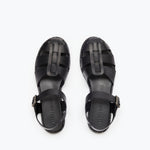 Black SERA FISHERMAN sandal by FREDA SALVADOR with a woven strap design and closed toe, perfect for casual summer wear.