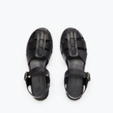 Black SERA FISHERMAN sandal by FREDA SALVADOR with a woven strap design and closed toe, perfect for casual summer wear.