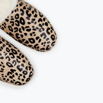 Freda Salvador James shearling slipper in tan and black with cozy shearling lining and slip-on design.